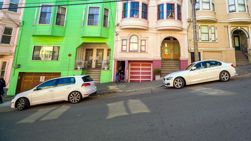 car rolling downhill vs. secured