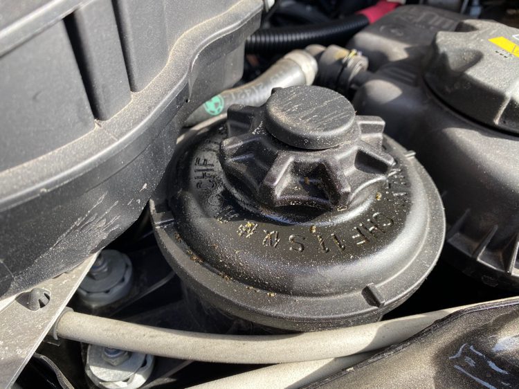 power steering reservoir location