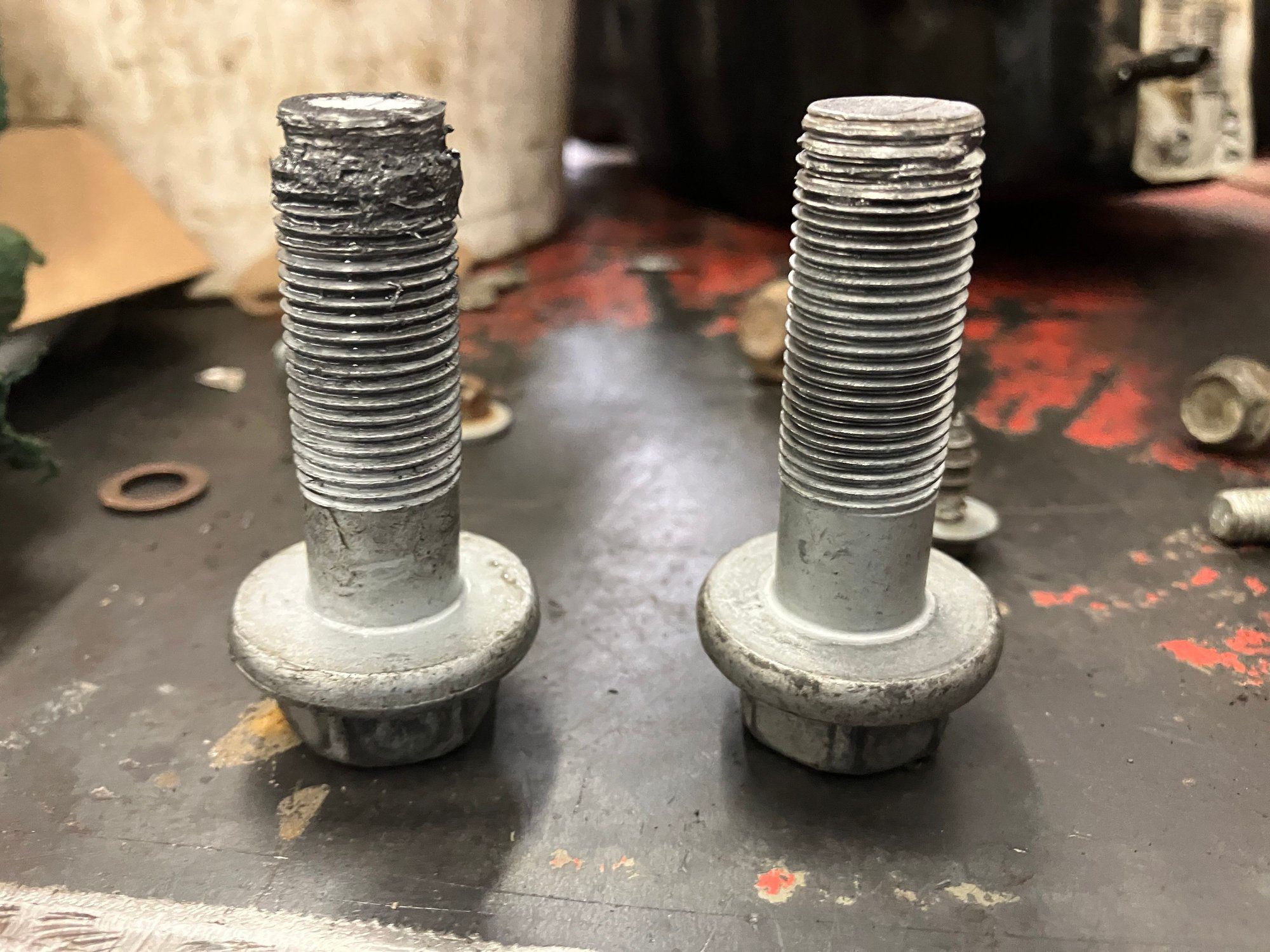 stripped caliper bolt vs. properly torqued